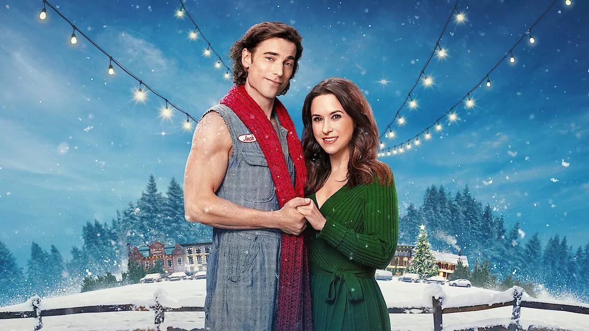 Couple enjoying romantic Christmas movies together on the couch